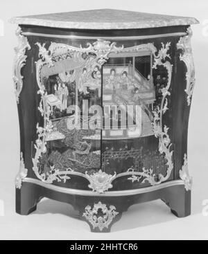 Corner cabinet (encoignure) (one of a pair) ca. 1745–49 Bernard II van Risenburgh In January 1750 and April 1751, the Parisian marchand-mercier Lazare Duvaux (ca. 1703–1758) sold two pairs of corner cabinets for 580 and 650 livres, respectively.[1] Veneered with Coromandel lacquer and mounted with gilt bronze, they were fitted with Antin marble tops. Although the descriptions are too brief to permit a positive identification with the Museum’s pair, whose tops, moreover, are of a different type of marble (perhaps replacements), these entries in the famous dealer’s account book offer a good idea Stock Photo