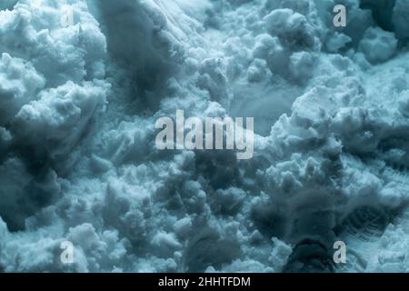 Snow surface. Fresh fluffy snow texture. Blue light luminance Stock Photo