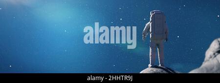astronaut looking at the sky, background banner Stock Photo