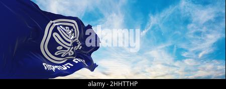 flag of Antiquities Authority , Israel at cloudy sky background on sunset, panoramic view. Israeli travel and patriot concept. copy space for wide ban Stock Photo
