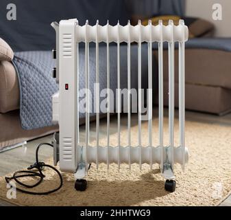 Electric oil-filled convection heater used in domestic heating Stock Photo