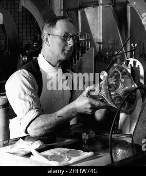 Brierley Hill Glassworks  1st April 1952Ernie Rowley engraving a vase in the works of Stevens and Williams Limited at Brierley Hill near Stourbridge. Stock Photo