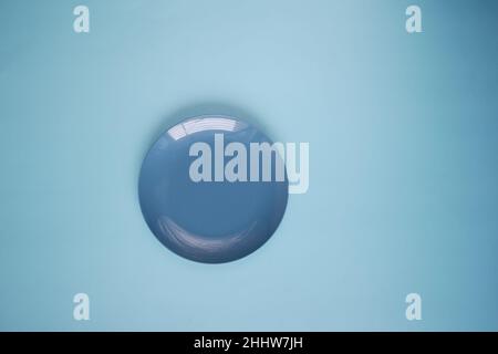 empty plate on light green background top down Stock Photo