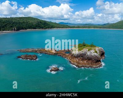 Wedge Island off the coast of Cape Hillsborough Australia rocky outcrop with two lone trees Stock Photo