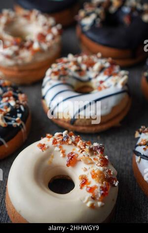 Homemade Gluten Free Chiffon Donuts with Dark and White Chocolate Glaze Nougat Peanut Stock Photo