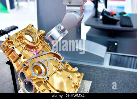 Coordinate measuring machine (CMM) 3d measurement technologies to check the validity of the engine block for industrial manufacturing Stock Photo