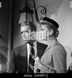 James Stewart and Doris Day on the set of the film 'The Man Who Knew Too Much' directed by Alfred Hitchcock. 14th June 1955. Stock Photo