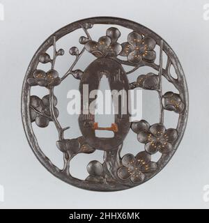 Sword Guard (Tsuba) early 19th century Japanese A tsuba is a sword guard and part of a sword mounting. It is mounted between the sword’s blade and grip to protect the user’s hands.. Sword Guard (Tsuba)  29517 Stock Photo