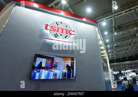NANJING, CHINA - JUNE 9, 2021 - Visitors visit the booth of TSMC at the ...