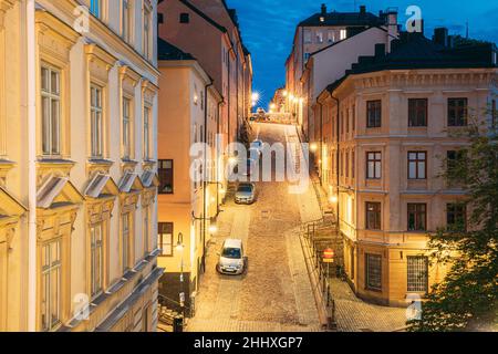 Stockholm, Sweden. Night View Of Traditional Stockholm Street. Residential Area, Cozy Street In Downtown. District Mullvaden First In Sodermalm. Cars Stock Photo