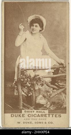 Daisy Hall, from the Actors and Actresses series (N145-7) issued by Duke Sons & Co. to promote Duke Cigarettes 1880s Issued by W. Duke, Sons & Co. Trade cards from the set 'Actors and Actresses' (N145-7), issued in the 1880s by W. Duke Sons & Co. to promote Duke Cigarettes. There are eight subsets of the N145 series. Various subsets sport different card designs and also promote different tobacco brands represented by W. Duke Sons & Company. This card is from the seventh subset, N145-7. Note that actors' names are spelled differently on cards throughout set and are not dependable for accuracy.. Stock Photo
