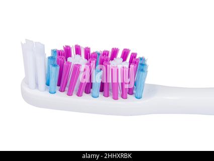 White and violet toothbrush for healthcare teeth on the white isolated Stock Photo