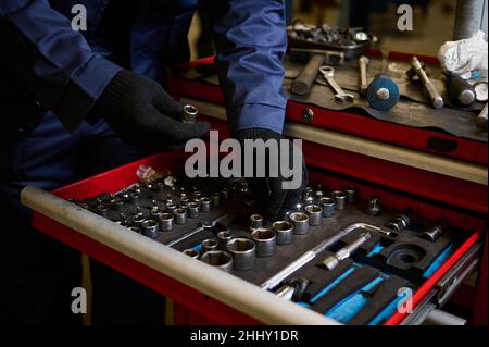 Close-up of a set of torx for socket spanner and hand tools and wrenches in box. Garage painting car service. Tool to repair the car or replace automo Stock Photo