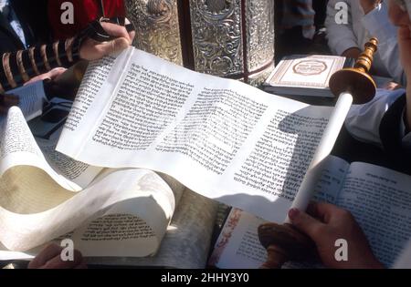 ISRAEL. JERUSALEM.  ULTRA ORTHODOX JEW READ THE MEGILLAH ESTHER BOOK AT THE WESTERN WALL DURING PURIM FESTIVAL Stock Photo