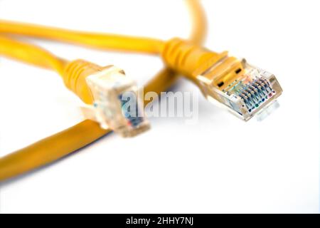 Yellow network cable isolated on white background Stock Photo