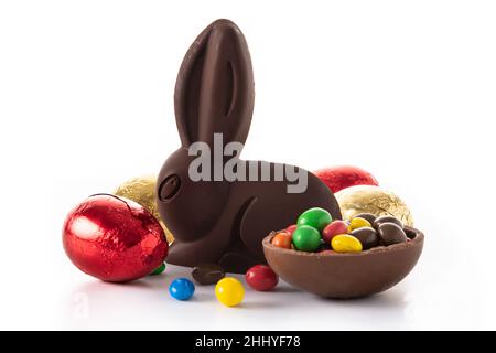 Easter chocolate bunny and colorful eggs isolated on white background Stock Photo