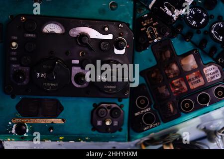 Toggle switches old soviet helicopter mi2 many text on Russian language which translates Light danger Beacon Suspension Cargo Dump Tactical Emergency Stock Photo