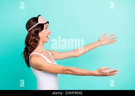 Profile photo of astonished person raise arms excited to hug open mouth empty space isolated on teal color background Stock Photo