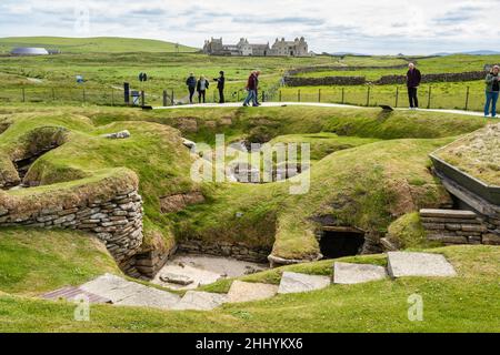 Neolithic settlement of Skara Brae next to Bay of Skaill near Sandwick on Mainland Orkney in Scotland Stock Photo