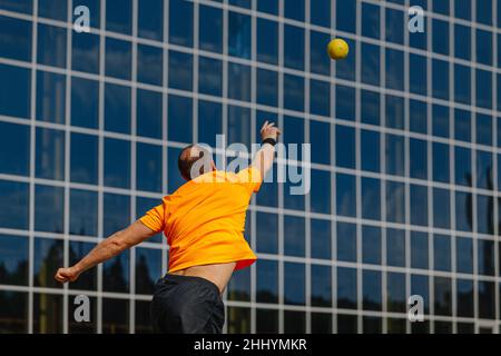 shot put at competition male athlete throwing Stock Photo