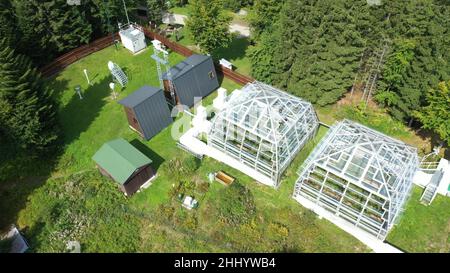 Greenhouse station open top chambers climate change science research Bily Kriz, plant spruce Picea abies Norway European and mountain beech Fagus Stock Photo