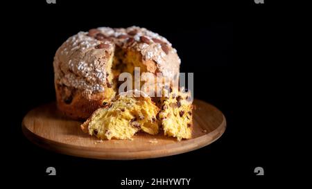Italian Panettone on a wooden board Stock Photo
