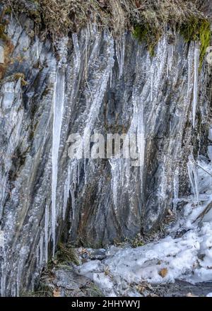 Details of ice stalactites in the Àneu valley in winter (Alt Pirineu Natural Park, Catalonia, Spain, Pyrenees) ESP: Detalles de estalactitas de hielo Stock Photo