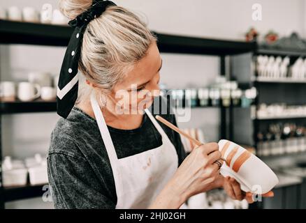 Every artist dips her brush into her soul Stock Photo