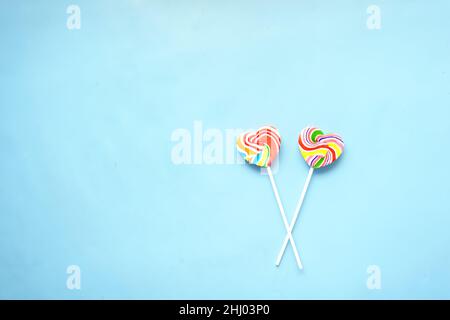 close up of lollipop candy on blue background  Stock Photo