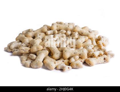 front view pile of heathy bone shapes  biscuits treats  used for training and occasions ,  white isolated background  macro shot Stock Photo