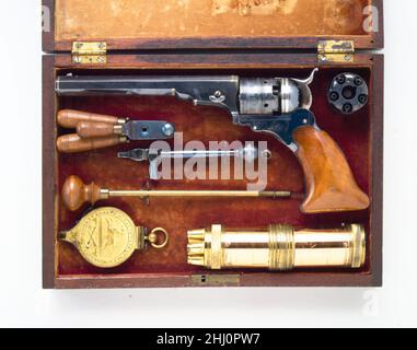 Colt Paterson Percussion Revolver, No. 3, Belt Model, Serial no. 156, with Case and Accessories ca. 1838 Samuel Colt American In 1835 and 1836, the American inventor and industrialist Samuel Colt (1814–1862) patented a revolutionary type of multishot pistol that is still used today. Colt's revolvers had a rotating cylinder that could be loaded with several rounds and fired quickly by cocking and releasing the hammer or, in later models, by simply pulling the trigger. Early Colt firearms used percussion ignition and had to be loaded with powder, bullets, and ignition caps in separate operations Stock Photo