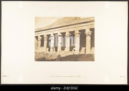 Colonnade latérale de la cour du Temple d'Isis, à Philae April 1850 Maxime Du Camp French Maxime Du Camp's mission to Egypt and the Near East in 1849-51 to make a photographic survey of monuments and sites is well documented in his writings and in those of his fellow traveler, Gustave Flaubert. After an initial stay in Cairo, the two friends hired a boat to take them up the Nile as far as the second cataract, after which they descended the river at leisure, exploring the archaeological sites along its banks. In July 1850 they left Egypt for Palestine, Turkey, and Greece before they parted in I Stock Photo