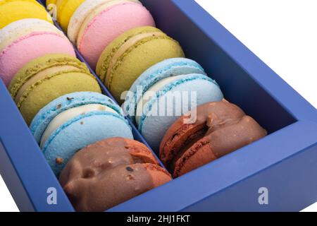 Exclusive macaroons in blue box isolated on the white Stock Photo