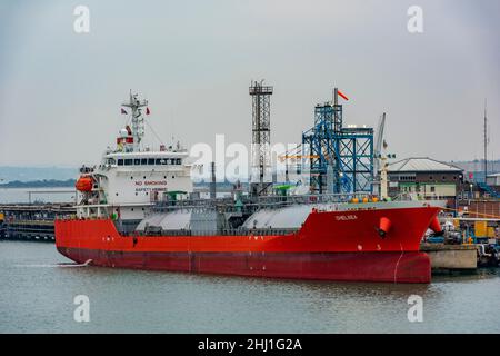 LPG gas tanker MV Chelsea alongside at the fawley petrochemical marine terminal oil refinery at southampton docks uk. port of southampton. Stock Photo