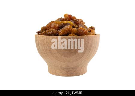 royal raisins in wooden bowl isolated on white background.Spice and food ingredients. Stock Photo