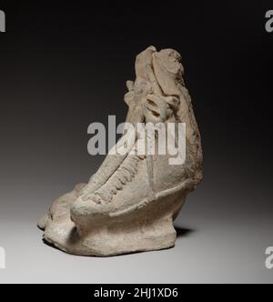 Left foot, possibly from a relief 2nd century B.C. Cypriot The foot, wearing a boot, is handmade and hollow. It is from a figure of approximately two-thirds life size.. Left foot, possibly from a relief  241021 Stock Photo