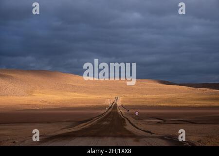 A sunrise view along B-245, the main road between San Pedro de Atacama and the El Tatio Geysers Stock Photo