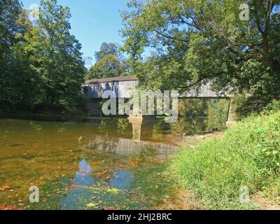 Schofield Ford Covered Bridge,with reflections at Tyler State Park  in Bucks County,Pennsylvania,over Neshaminy Creek. Stock Photo