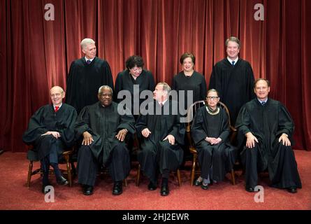 The Supreme Court Justices pose for their official group portrait in the Supreme Court on November 30, 2018 in Washington, DC Seated from left: Associate Justice Stephen Breyer, Associate Justice Clarence Thomas, Chief Justice John G. Roberts, Associate Justice Ruth Bader Ginsburg and Associate Justice Samuel Alito, Jr. Standing behind from left: Associate Justice Neil Gorsuch, Associate Justice Sonia Sotomayor, Associate Justice Elena Kagan and Associate Justice Brett M. Kavanaugh. (Photo by Kevin Dietsch/Pool/Sipa USA) Stock Photo