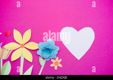 Paper art, bright summer holiday handmade flowers, craft on a pink background.. Colorful postcard for Mother's Day, Easter. Stock Photo