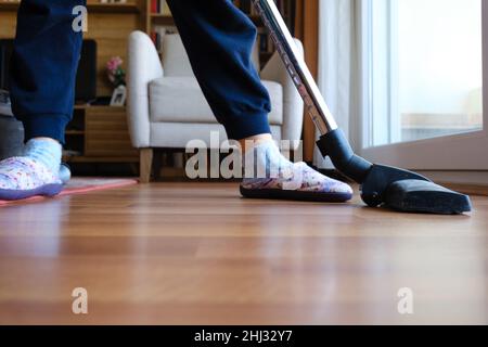 Beautiful Female Maid Cleaning Wooden Floor With Vacuum Cleaner Stock ...
