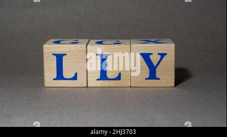 January 19, 2022. New York, USA. Exchange Ticker symbol of Eli Lilly and Company LLY made of wooden cubes on a gray background. Stock Photo