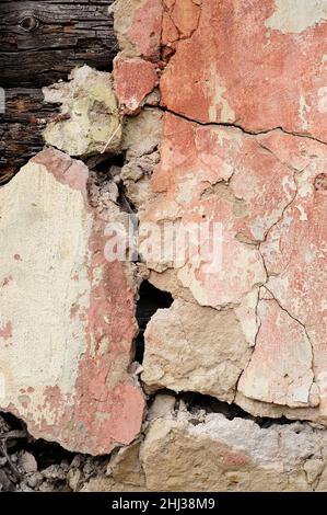 Old plastered cracked wall painted  brown background Stock Photo