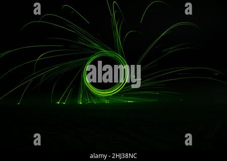 Circles with sparks on a black background