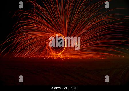 Circles with sparks on a black background