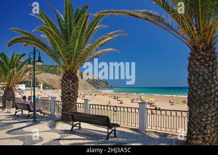 Beach promenade view, Praia da Luz, Algarve Region, Portugal Stock Photo