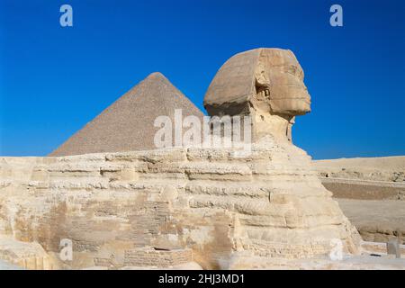 The Great Sphinx and the Pyramid of Khufu, Giza, Egypt Stock Photo