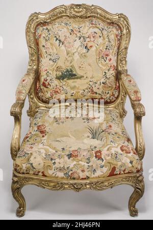 Chair back 1754–56 Beauvais This tapestry panel is part of a set of twelve armchairs and two settees ordered in Paris in 1753 by Baron Johann Ernst Bernstorff, Danish ambassador to the court of Versailles between 1744 and 1751. After returning to Denmark, Bernstorff commissioned this seat furniture for the tapestry room of his new residence in Copenhagen that was hung with four wall tapestries of the Amours des Dieux series woven at the Beauvais Manufactory. The tapestry covers are woven with animal and bird subjects after designs by the painter Jean-Baptiste Oudry (1686–1755). For a fuller de Stock Photo