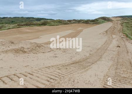 Coastal sand dunes recently scraped clear of vegetation by the Sands of Life project to boost wildlife and plant diversity, Merthyr Mawr Warren NNR, G Stock Photo