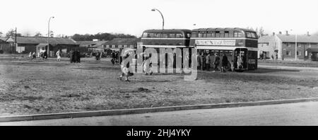 Kirkby, a town in the Metropolitan Borough of Knowsley, Merseyside, England. Our picture shows, a bus centre, but no shelter, Kirkby, 20th October 1958. Stock Photo